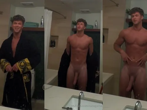 Nate Garner shows off his massive cock in the mirror